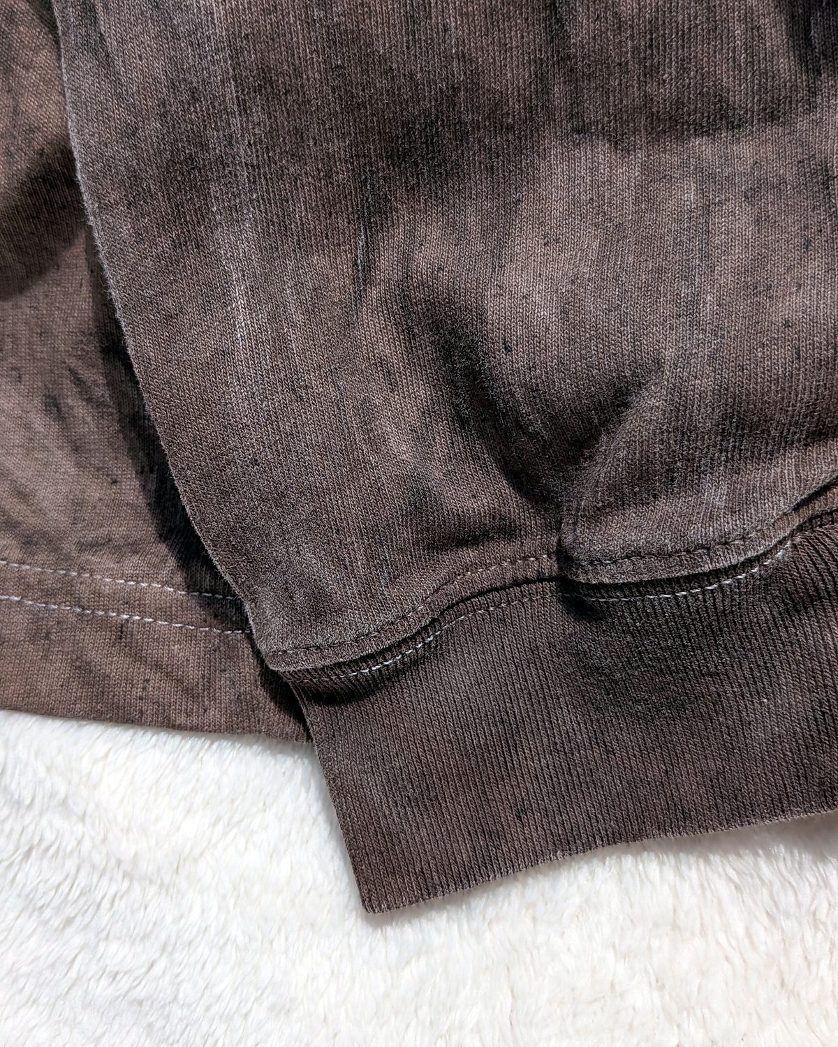 Ribbed cuff of a kakishibu-dyed long-sleeve T-shirt