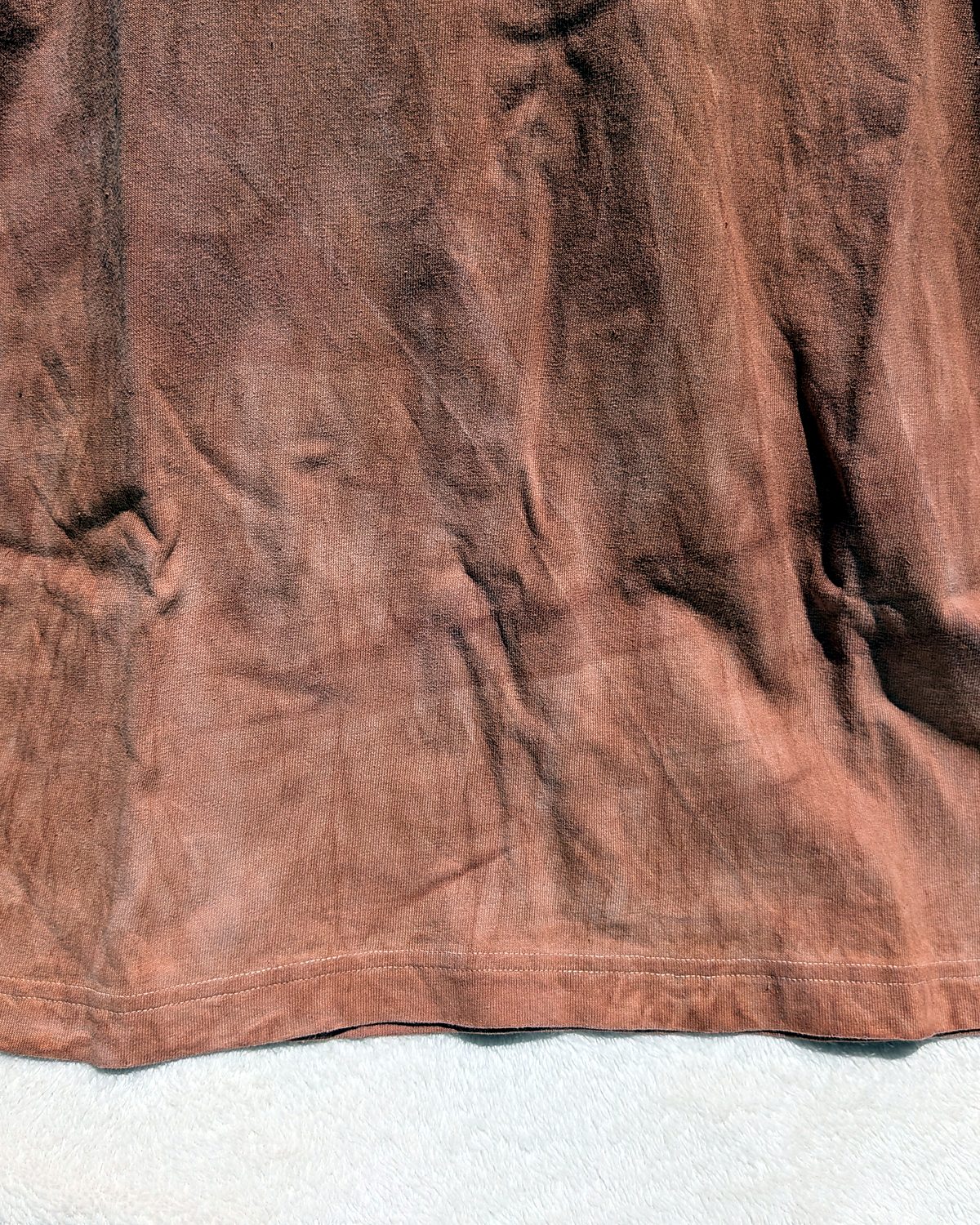 Hem of a kakishibu-dyed T-shirt